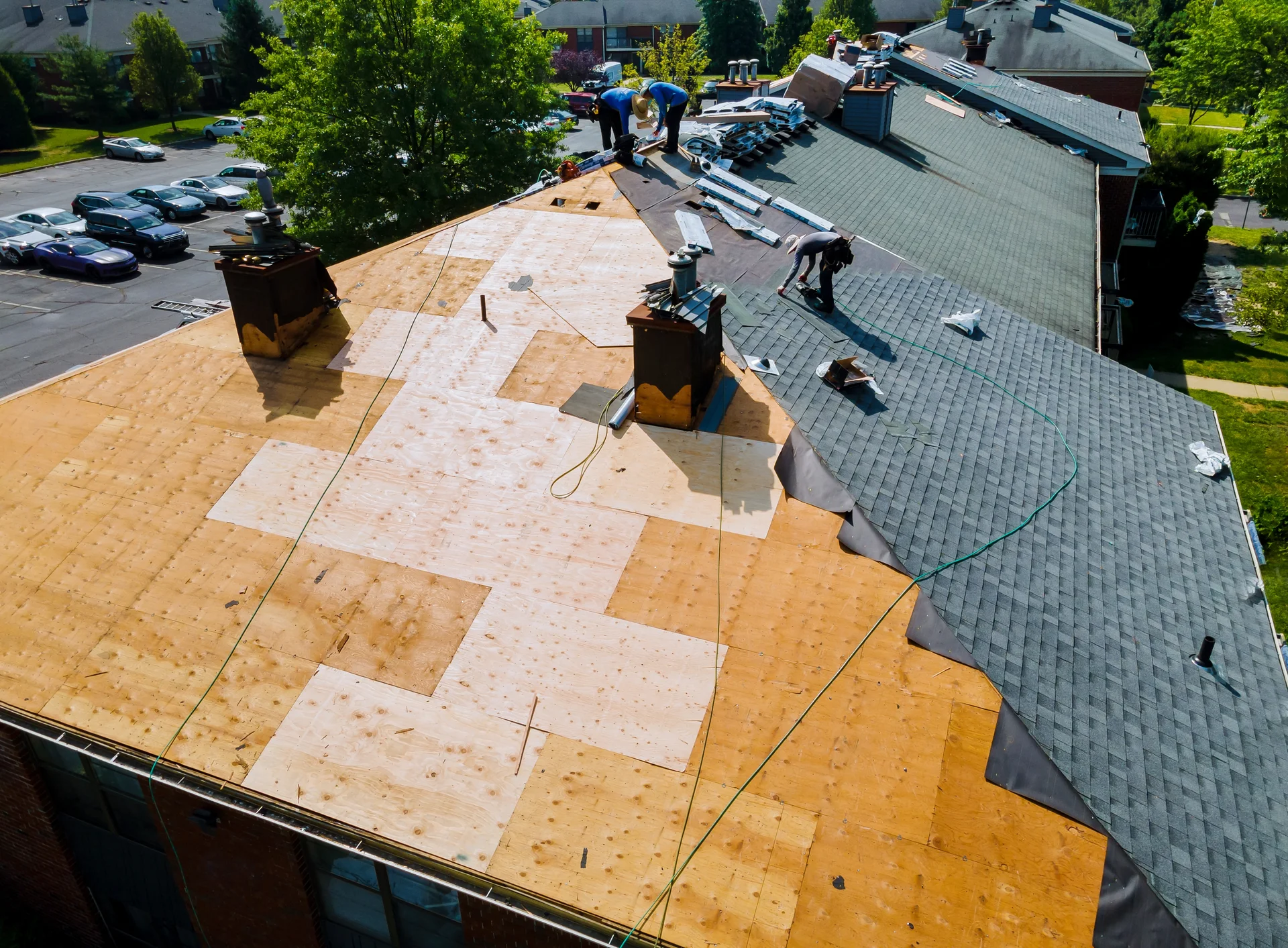 Battle Axe Roofing crew replacing a roof